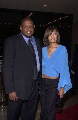 Forest Whitaker and wife Keisha Simone Nash at the premiere of Columbia Pictures Panic Room in Century City, 03-18-02 , 11096414.jpg, couple, midriff, pants, brunette, longhair, shorthair, black, fame, entertainment, star,
