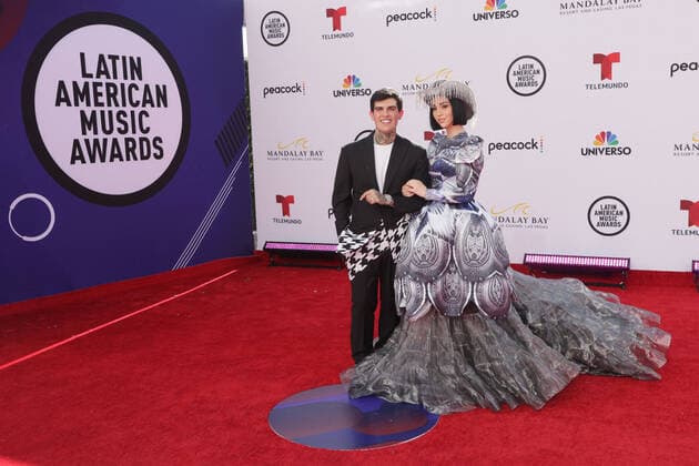 (L-R) Adriel Favela and Estibaliz Badiola arrive for the 2022 Latin American Music Awards at Michelob ULTRA Arena at Mandalay Bay Resort and Casino in Las Vegas, Nevada on Thursday, April 21, 2022.  LAV20220421075 JAMESxATOA