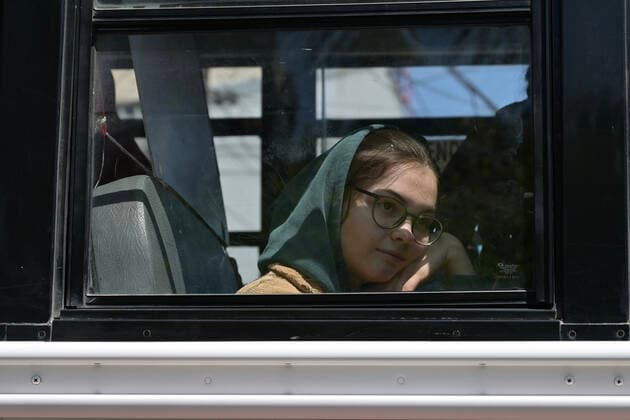 April 21, 2022, Tijuana, Baja California, Mexico: Ukrainian refugees waiting for their turn to get bused for processing to enter the U.S. at the Benito Juarez Sports Complex in Tijuana, Mexico on Thursday, April 21, 2022. ..The Biden Administration announced today that the United States will no longer accept Ukrainian refugees who arrive at the U.S.-Mexico border to seek asylum, instead they will proceeded directly when arriving only via Europe to the States...The move is expected to speed up the processing of applications for Ukrainian refugees and others fleeing war, but it will no longer routinely grant entry to anyone who shows up at the border which thousands have done so previously since the Russian invasion of Ukraine on February 24. - ZUMAm180 20220421_zip_m180_012 Copyright: xCarlosxA.xMorenox