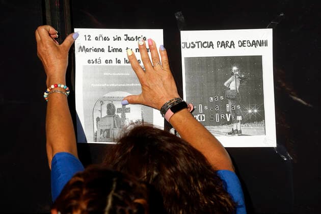 April 22, 2022, Mexico City, Mexico City, Mexico: Feminist activists put the photographs of women victims of femicide outside the Attorney General s Office, demanding justice for all of them and for young Debanhi Escobar Bazaldua, whose body was located after being missing for 13 days in the state of Nuevo Leon. On Apr 22, 2022 In Mexico City, Mexico. Mexico City Mexico - ZUMAe321 20220422_zia_e321_017 Copyright: xLuisxBarronx xEyepixxGroupx