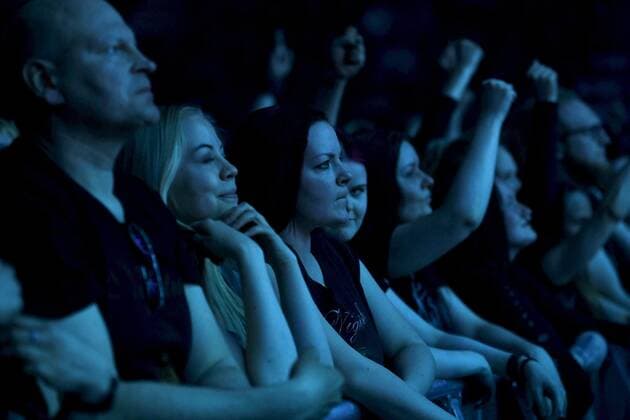 Fans of cheers as the Finnish symphonic metal band Nightwish performs on stage during their concert in Helsinki, Finland, on April 24, 2022. Helsinki Finland  Copyright: xHeikkixSaukkomaax LKLAPH20220424212818B383