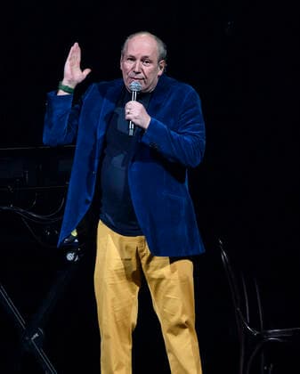 The German Oscar, Grammy and Golden Globe winning composer Hans Zimmer dressed in the colors of Ukraine and his partly Ukrainian orchestra on stage in the Royal Arena on Wednesday 27 April 2022 Hans Zimmer has made music for more than 200 projects, which together have earned close to a staggering 200 billion kr, Copenhagen  Copyright: TorbenxChristensen TorbenxChristensenx COP10686 spdk20220428-010035-L