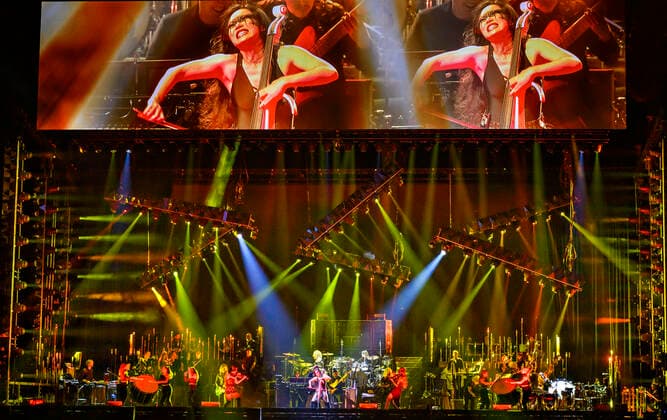 The German Oscar, Grammy and Golden Globe winning composer Hans Zimmer dressed in the colors of Ukraine and his partly Ukrainian orchestra on stage in the Royal Arena on Wednesday 27 April 2022 Hans Zimmer has made music for more than 200 projects, which together have earned close to a staggering 200 billion kr, Copenhagen  Copyright: TorbenxChristensen TorbenxChristensenx COP10686 spdk20220428-010055-L