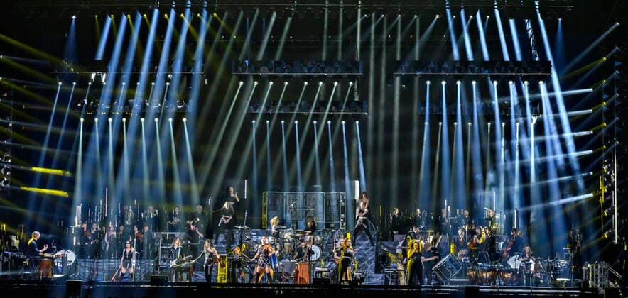 The German Oscar, Grammy and Golden Globe winning composer Hans Zimmer dressed in the colors of Ukraine and his partly Ukrainian orchestra on stage in the Royal Arena on Wednesday 27 April 2022 Hans Zimmer has made music for more than 200 projects, which together have earned close to a staggering 200 billion kr, Copenhagen  Copyright: TorbenxChristensen TorbenxChristensenx COP10686 spdk20220428-010111-L