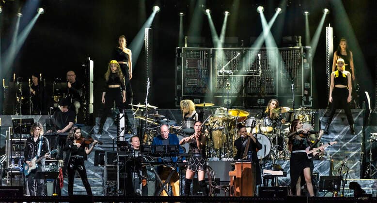 The German Oscar, Grammy and Golden Globe winning composer Hans Zimmer dressed in the colors of Ukraine and his partly Ukrainian orchestra on stage in the Royal Arena on Wednesday 27 April 2022 Hans Zimmer has made music for more than 200 projects, which together have earned close to a staggering 200 billion kr, Copenhagen  Copyright: TorbenxChristensen TorbenxChristensenx COP10686 spdk20220428-010124-L