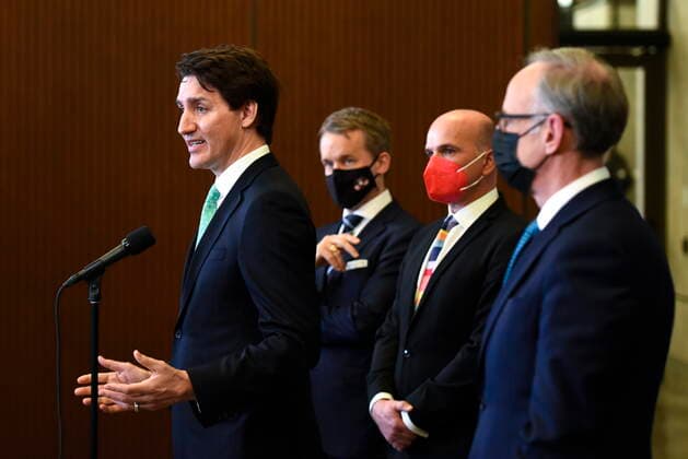 April 28, 2022, Ottawa, ON, CAN: Prime Minister Justin Trudeau speaks as Minister of Labour Seamus O Regan, Minister of Tourism Randy Boissonnault and Liberal MP Rob Oliphant listen during an announcement on the ending of the Canadian Blood ServicesöÄÃ blood ban, in Ottawa, on Thursday, April 28, 2022. Ottawa CAN  - ZUMAc35_ 20220428_zaf_c35_022 Copyright: xJustinxTangx