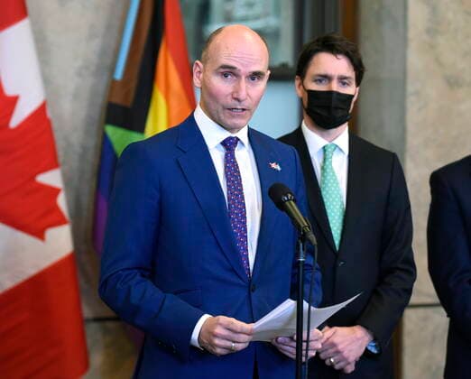 April 28, 2022, Ottawa, ON, CAN: Minister of Health Jean-Yves Duclos speaks as Prime Minister Justin Trudeau listens during an announcement on the ending of the Canadian Blood ServicesöÄÃ blood ban, in Ottawa, on Thursday, April 28, 2022. Ottawa CAN  - ZUMAc35_ 20220428_zaf_c35_024 Copyright: xJustinxTangx