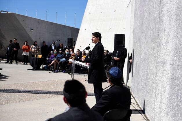 April 28, 2022, Ottawa, ON, CAN: Prime Minister Justin Trudeau speaks during a Yom HaShoah commemoration at the National Holocaust Monument in Ottawa, on Thursday, April 28, 2022. Yom HaShoah is the Jewish community s most significant day for Holocaust remembrance. Ottawa CAN  - ZUMAc35_ 20220428_zaf_c35_039 Copyright: xJustinxTangx