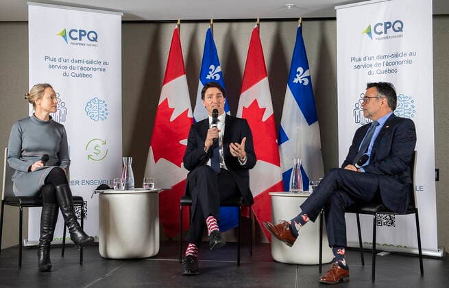 April 29, 2022, Montreal, PQ, Canada: Prime Minister Justin Trudeau, centre, addresses members of the Conseil du patronat du Quebec as CPQ CEO Karl Blackburn and President of the Board of Directors Emilie Dussault look on in Montreal, Friday, April 29, 2022. Montreal Canada  - ZUMAc35_ 20220429_zaf_c35_044 Copyright: xGrahamxHughesx
