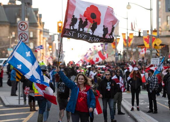 April 29, 2022, Ottawa, ON, CAN: A participant waves a Remembrance flag during a demonstration, part of a convoy-style protest participants are calling Rolling ThunderöÄÃ¹, in Ottawa, on Friday, April 29, 2022. Ottawa CAN  - ZUMAc35_ 20220429_zaf_c35_104 Copyright: xJustinxTangx