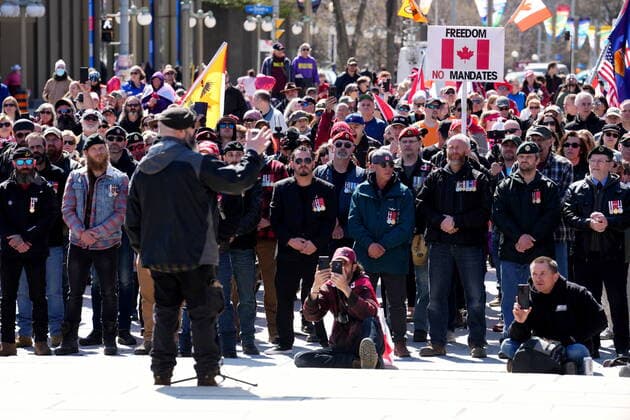 April 30, 2022, Ottawa, ON, CANADA: Participants gather to listen to a speaker at the National War Memorial during a demonstration, part of a convoy-style protest participants are calling Rolling Thunder , in Ottawa, Saturday, April 30, 2022. Ottawa CANADA  - ZUMAc35_ 20220430_zaf_c35_032 Copyright: xSeanxKilpatrickx