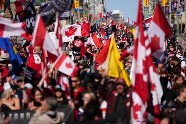 April 30, 2022, Ottawa, ON, CANADA: Protesters gather and wave flags during a demonstration, part of a convoy-style protest participants are calling Rolling Thunder , in Ottawa, Saturday, April 30, 2022. Ottawa CANADA  - ZUMAc35_ 20220430_zaf_c35_122 Copyright: xSeanxKilpatrickx