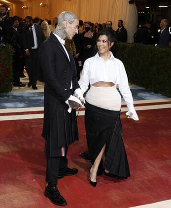 Travis Barker and Kourtney Kardashian arrive on the red carpet for The Met Gala at The Metropolitan Museum of Art celebrating the Costume Institute opening of In America: An Anthology of Fashion in New York City on Monday, May 2, 2022.  NYP20220502256 JOHNxANGELILLO