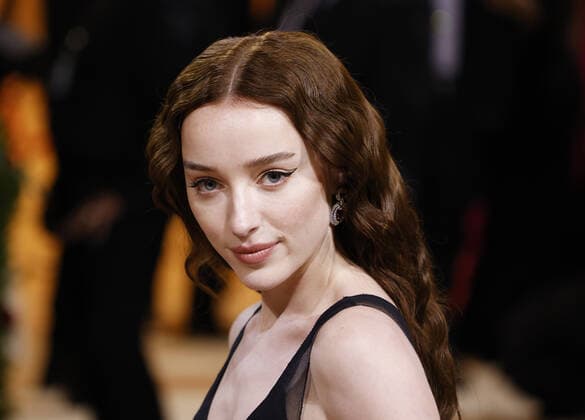 Phoebe Dynevor arrives on the red carpet for The Met Gala at The Metropolitan Museum of Art celebrating the Costume Institute opening of In America: An Anthology of Fashion in New York City on Monday, May 2, 2022.  NYP202205022318 JOHNxANGELILLO