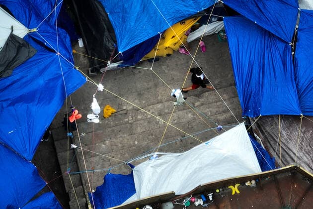 (220503) -- REYNOSA, May 3, 2022 -- Aerial photo taken on May 2, 2022 shows a migrant walking through tents at a migrant camp in Reynosa, Tamaulipas, Mexico. ) MEXICO-REYNOSA-U.S.-BORDER-MIGRANTS XinxYuewei 