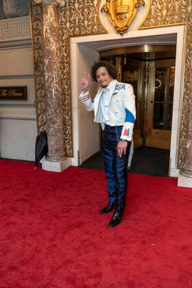 NY: Met Gala 2022 departures from The Pierre hotel Anthony Ramos wearing dress by Tommy Hilfiger departs The Pierre Hotel for the 2022 Met Gala on a theme In America: An Anthology of Fashion with dress code calls for gilded glamour New York New York United States Copyright: LevxRadin