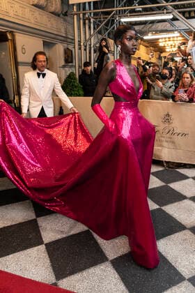 NY: Met Gala 2022 departures from The Pierre hotel Anok Yai wearing dress by Michael Kors departs The Pierre Hotel for the 2022 Met Gala on a theme In America: An Anthology of Fashion with dress code calls for gilded glamour New York New York United States Copyright: LevxRadin