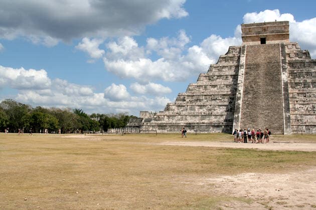 A crowd of tourists at Chichen Itza, (Mayan Ruins) in Mexico. , 2143585.jpg, tourists, chichen itza, temple of Kukulkan, mexico, mayan, pyramid, travel, steps, group, people, lots, field, ruins, tourism, travel, yucatan, sunny, clouds, blue sky, horizontal, copyspace, toltec, ancient, civilizations, civilization, mayan riviera, outdoors, stone, huge, lots,