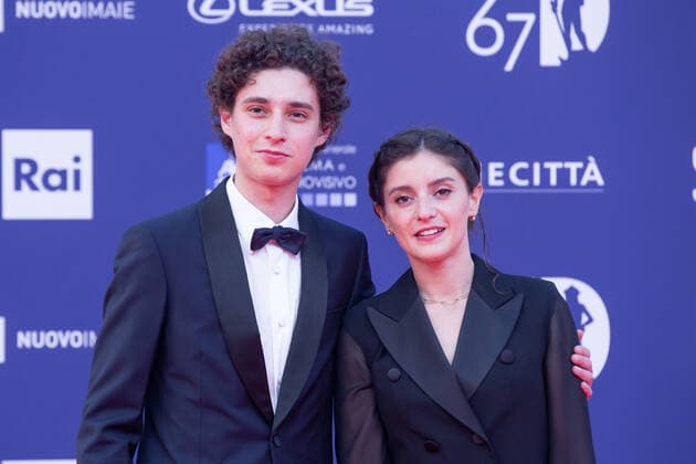 Verleihung des David di Donatello-Preises 2022 in Rom Italy: Red Carpet of David di Donatello 2022 Awards ceremony Filippo Scotti with his sister attends the red carpet of David di Donatello 2022 awards ceremony in Rome Rome Italy Copyright: MatteoxNardone