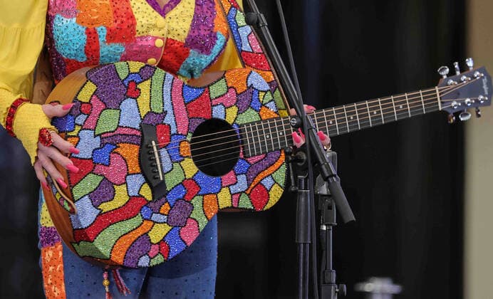 May 5, 2022, Wilmington, DE, United States of America: Singer DOLLY PARTON performs during an event to celebrate Dolly PartonÃ¢â‚¬â ¢s Imagination Library Thursday, May 05, 2022, at the Wilmington Public Library in Wilmington, DE. Wilmington United States of America - ZUMAs124 20220505_zap_s124_018 Copyright: xSaquanxStimpsonx