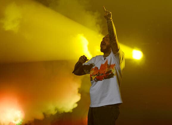 HOLLYWOOD FL - MAY 06: Post Malone performs during the Formula 1 Miami Grand Prix Concert at Hard Rock Live held at the Seminole Hard Rock Hotel & Casino on May 6, 2022 in Hollywood, Florida. Copyright: xmpi04x