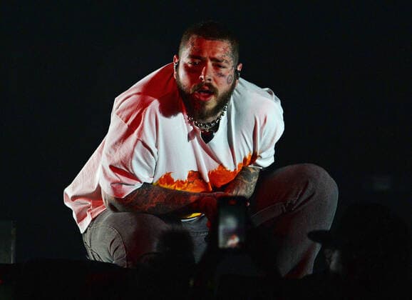 HOLLYWOOD FL - MAY 06: Post Malone performs during the Formula 1 Miami Grand Prix Concert at Hard Rock Live held at the Seminole Hard Rock Hotel & Casino on May 6, 2022 in Hollywood, Florida. Copyright: xmpi04x