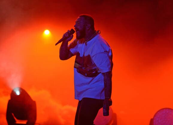 HOLLYWOOD FL - MAY 06: Post Malone performs during the Formula 1 Miami Grand Prix Concert at Hard Rock Live held at the Seminole Hard Rock Hotel & Casino on May 6, 2022 in Hollywood, Florida. Copyright: xmpi04x