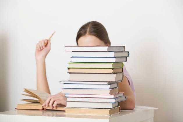 Young woman sits working at books, model released, , property released, , 10129862.jpg, Day,Working,Young Adult,Indoors,One Person Only,people,Lifestyle,Sitting,Woman,20s Adult,20-25 Years,Holding,Obscured Face,Book,Learning,Desk,Education,Caucasian,Student,Pencil,young woman,inside,Apartment,Warehouse,Modern Living,Spacious,Modern Lifestyle,Loft,one woman,Unrecognisable Person,Revision,Conversion,Loft Living, Russia
