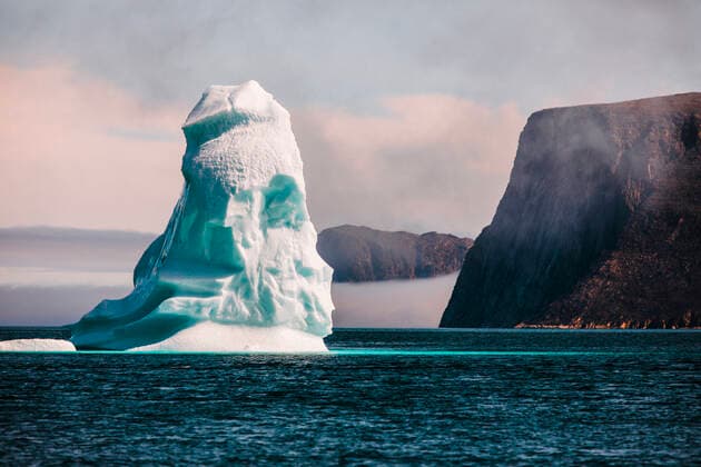 Iceberg floats in the Arctic Ocean, Baffin Island, Canada. Iqaluit, Nunavut, Canada CR_JDIP210729C-321045-01