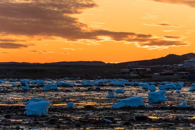 Sunset above melting ice chunks, Iqaluit, Canada. Iqaluit, Nunavut, Canada CR_JDIP210729C-321123-01