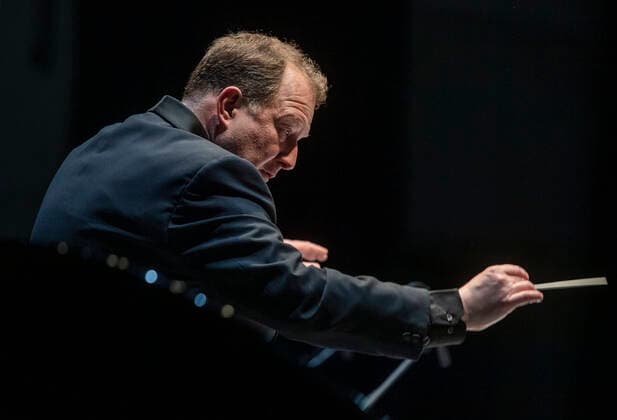 Conductor David Robert Coleman performs with Moravian Philharmonic during the opening concert of pianist and composer Uri Caine at the American Spring International Music Festival in Prague, Czech Republic, May 10, 2022. (CTKxPhoto MichaelaxRihova) CTKPhotoP2022051008703  mir 6
