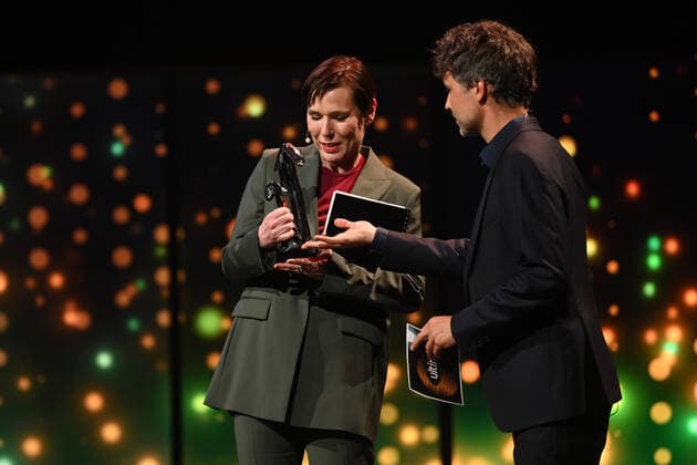Writer Annelies Verbeke receives the Literature Award from host Thomas Vanderveken at the award ceremony of the Ultimas 2022 , Flemish culture prizes, Tuesday 10 May 2022, in Antwerp.  DIRKxWAEM 34701284