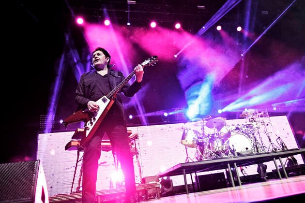 Guitarist Charlie Burchill Simple Minds at a concert of the Celebrating 40 Years of Hits tour at the Halle Münsterland in Münster Guitarist Charlie Burchill Simple Minds at a concert of the Celebrating 40 Years of Hits tour at the Halle Münsterland in Münster snapshot photography D Vorndran