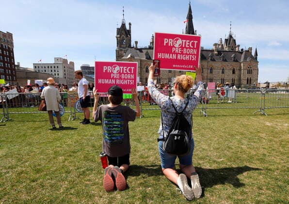 May 12, 2022, Ottawa, ON, CANADA: People take part in the March for Life on Parliament Hill in Ottawa on Thursday, May 12, 2022. Ottawa CANADA  - ZUMAc35_ 20220512_zaf_c35_137 Copyright: xPatrickxDoylex