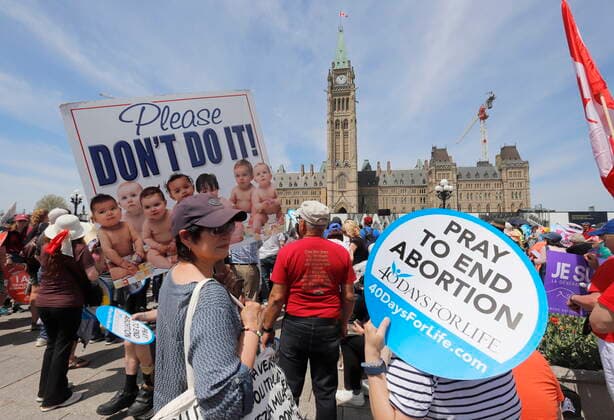 May 12, 2022, Ottawa, ON, CANADA: People take part in the March for Life on Parliament Hill in Ottawa on Thursday, May 12, 2022. Ottawa CANADA  - ZUMAc35_ 20220512_zaf_c35_140 Copyright: xPatrickxDoylex
