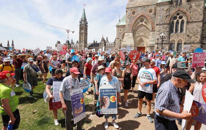 May 12, 2022, Ottawa, ON, CANADA: People take part in the March for Life on Parliament Hill in Ottawa on Thursday, May 12, 2022. Ottawa CANADA  - ZUMAc35_ 20220512_zaf_c35_146 Copyright: xPatrickxDoylex