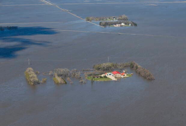 May 15, 2022, WINNIPEG, MB, CANADA: Properties near Emerson, Man., are isolated as a result of the Red River overflowing its banks south of Winnipeg, Sunday, May 15, 2022. WINNIPEG CANADA  - ZUMAc35_ 20220515_zaf_c35_081 Copyright: xJohnxWoodsx