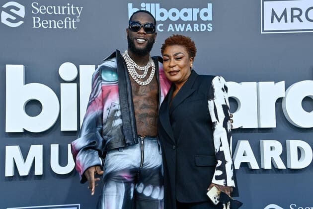 Burna Boy and Bose Ogulu attend the annual Billboard Music Awards held at the MGM Grand Garden Arena in Las Vegas, Nevada on May 15, 2022.  LAV202205150409 JIMxRUYMEN