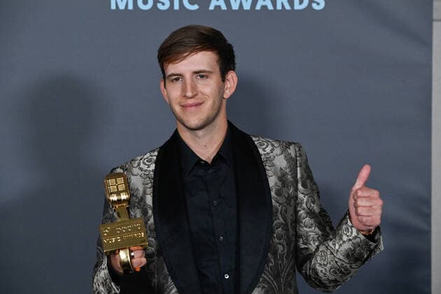 Illenium appears backstage with his award during the annual Billboard Music Awards held at the MGM Grand Garden Arena in Las Vegas on May 15, 2022. The musician was honored with Top Dance Electronic Album for Fallen Embers .  LAV202205150618 JIMxRUYMEN