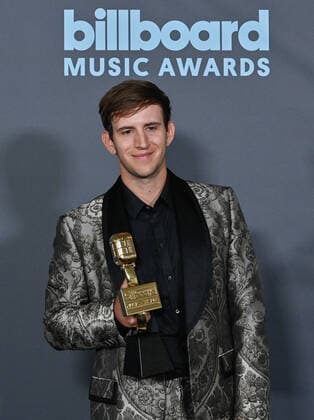 Illenium appears backstage with his award during the annual Billboard Music Awards held at the MGM Grand Garden Arena in Las Vegas on May 15, 2022. The musician was honored with Top Dance Electronic Album for Fallen Embers .  LAV202205150621 JIMxRUYMEN