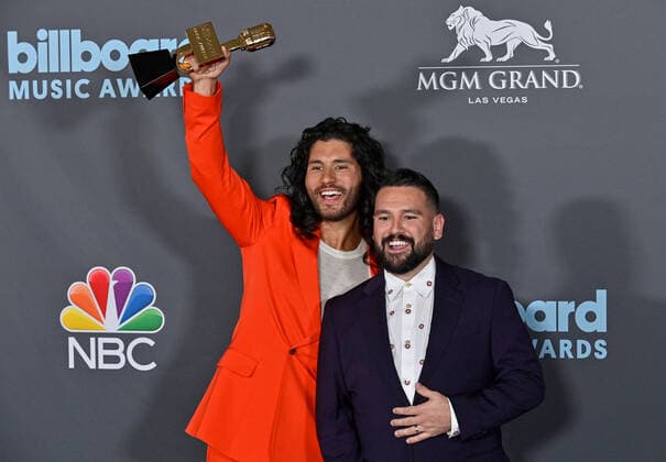 Shay Mooney and Dan Smyers of Dan + Shay appear backstage with their award during the annual Billboard Music Awards held at the MGM Grand Garden Arena in Las Vegas on May 15, 2022. The musicians were honored as Top Country Duo Group.  LAV202205150624 JIMxRUYMEN