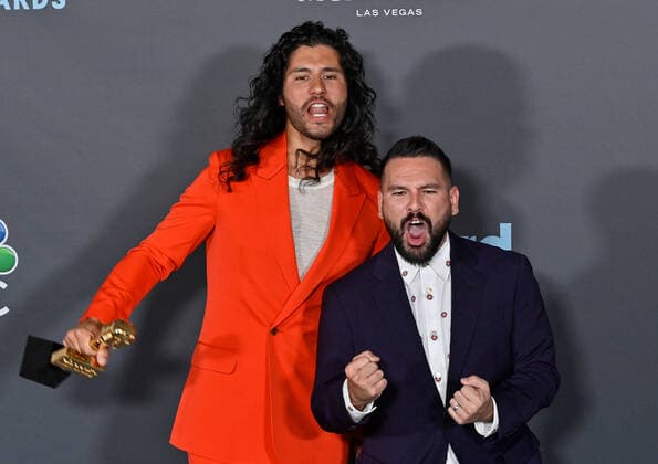 Shay Mooney and Dan Smyers of Dan + Shay appear backstage with their award during the annual Billboard Music Awards held at the MGM Grand Garden Arena in Las Vegas on May 15, 2022. The musicians were honored as Top Country Duo Group.  LAV202205150631 JIMxRUYMEN