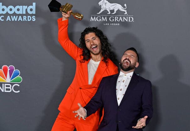 Shay Mooney and Dan Smyers of Dan + Shay appear backstage with their award during the annual Billboard Music Awards held at the MGM Grand Garden Arena in Las Vegas on May 15, 2022. The musicians were honored as Top Country Duo Group.  LAV202205150633 JIMxRUYMEN