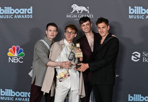 Drew MacFarlane, Dave Bayley, Edmund Irwin-Singer, and Joe Seaward of Glass Animals appear backstage with their award during the annual Billboard Music Awards held at the MGM Grand Garden Arena in Las Vegas on May 15, 2022. The musicians were honored as Top Rock Aritst .  LAV202205150644 JIMxRUYMEN