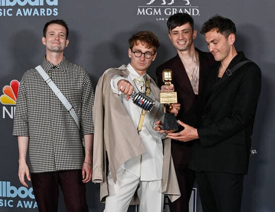 Drew MacFarlane, Dave Bayley, Edmund Irwin-Singer, and Joe Seaward of Glass Animals appear backstage with their award during the annual Billboard Music Awards held at the MGM Grand Garden Arena in Las Vegas on May 15, 2022. The musicians were honored as Top Rock Aritst .  LAV202205150645 JIMxRUYMEN