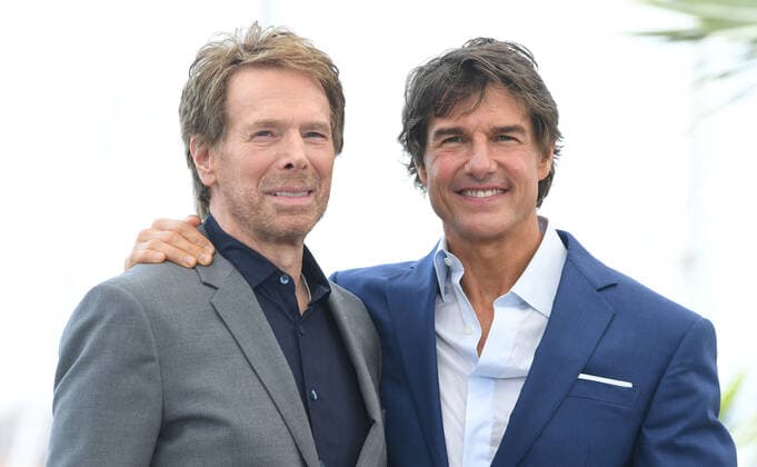American actor Tom Cruise and producer Jerry Bruckheimer attend the photo call for Top Gun: Maverick at Palais des Festivals at the 75th Cannes Film Festival, in Cannes, France on Wednesday, May 18, 2022.  CAN20220518168 RUNExHELLESTAD