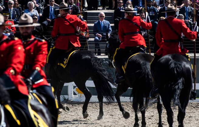 May 18, 2022, Ottawa, ON, Canada: Prince Charles watches a performance of the RCMP Musical Ride in Ottawa, during the Canadian Royal tour, on Wednesday, May 18, 2022. Ottawa Canada  - ZUMAc35_ 20220518_zaf_c35_113 Copyright: xJustinxTangx