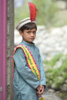 Pakistan: Chilmjushi Festival in the Kalsh Valley Kalashi women and men wearing traditional dresses participating in the dance during the Chilmjushi Festival in the Kalsh Valley. Chilum Joshi is also known as a Kalash spring festivals. Dressed up in newly knitted clothes with elaborate headgear and jewelry in vibrant colors , Kalasha women dance to traditional drumbeats during the chilum joshi festivals that concluded here at the scenic Bamburet valley on Sunday with fanfare. The four days event attracted an unprecedented number of tourists including a group of 22 Malaysian motorcyclists, besides the French, Australian and Italian nationals, on the concluding day of the festival young men women select their life partners while each day f Copyright: RanaxSajidxHussain