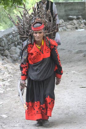 Pakistan: Chilmjushi Festival in the Kalsh Valley Kalashi women and men wearing traditional dresses participating in the dance during the Chilmjushi Festival in the Kalsh Valley. Chilum Joshi is also known as a Kalash spring festivals. Dressed up in newly knitted clothes with elaborate headgear and jewelry in vibrant colors , Kalasha women dance to traditional drumbeats during the chilum joshi festivals that concluded here at the scenic Bamburet valley on Sunday with fanfare. The four days event attracted an unprecedented number of tourists including a group of 22 Malaysian motorcyclists, besides the French, Australian and Italian nationals, on the concluding day of the festival young men women select their life partners while each day f Copyright: RanaxSajidxHussain