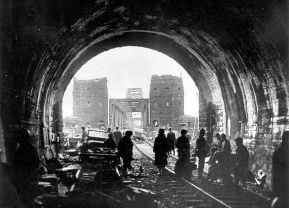 1st U.S Army troops cross Rhine (Remagen March, 7,1945) U.S soldiers and equipment pour over the Rhine river bridge (background) at Remagen (Germany) March 7,1945 Copyright: xPhoto12 Coll-DITE USISx DIT01068_174